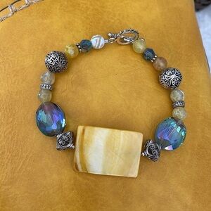 Primrose yellow silver iridescent beaded bracelet